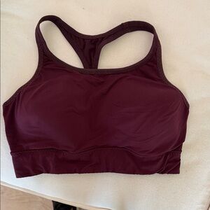 Women's Athleta Burgundy Sports Bra size medium. Built in pads!